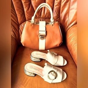 NWOT Gizzelli Designed Fancy beige Sandals with matching Matmazel hand bag .